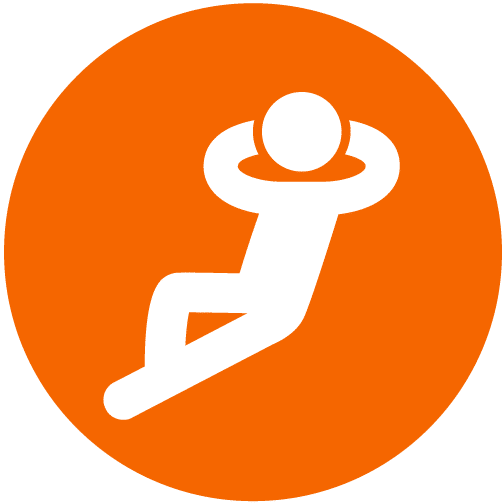A person sitting with their hands behind their head