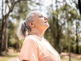 A woman with her eyes closed