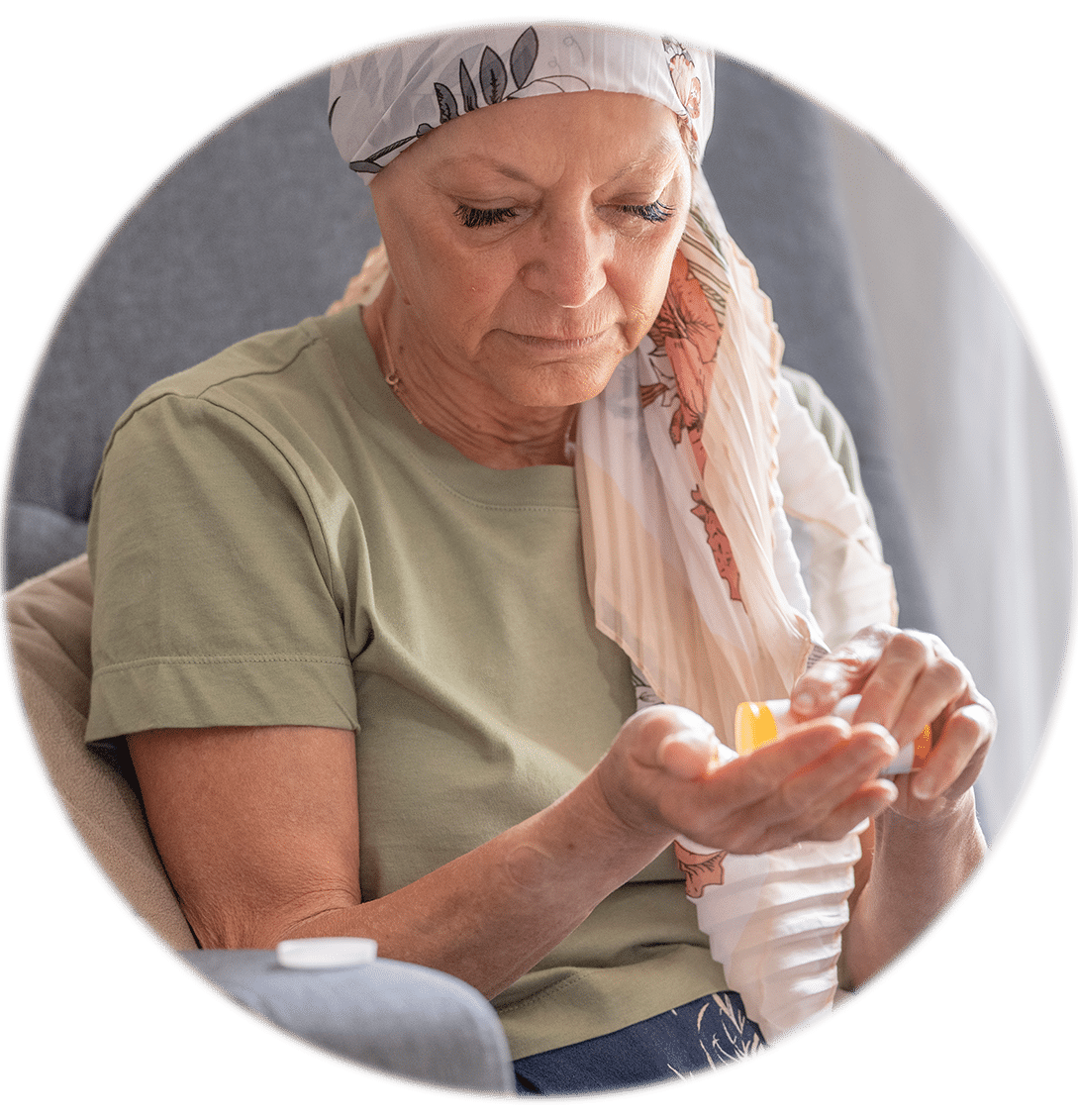 A woman pouring medicine into her hand